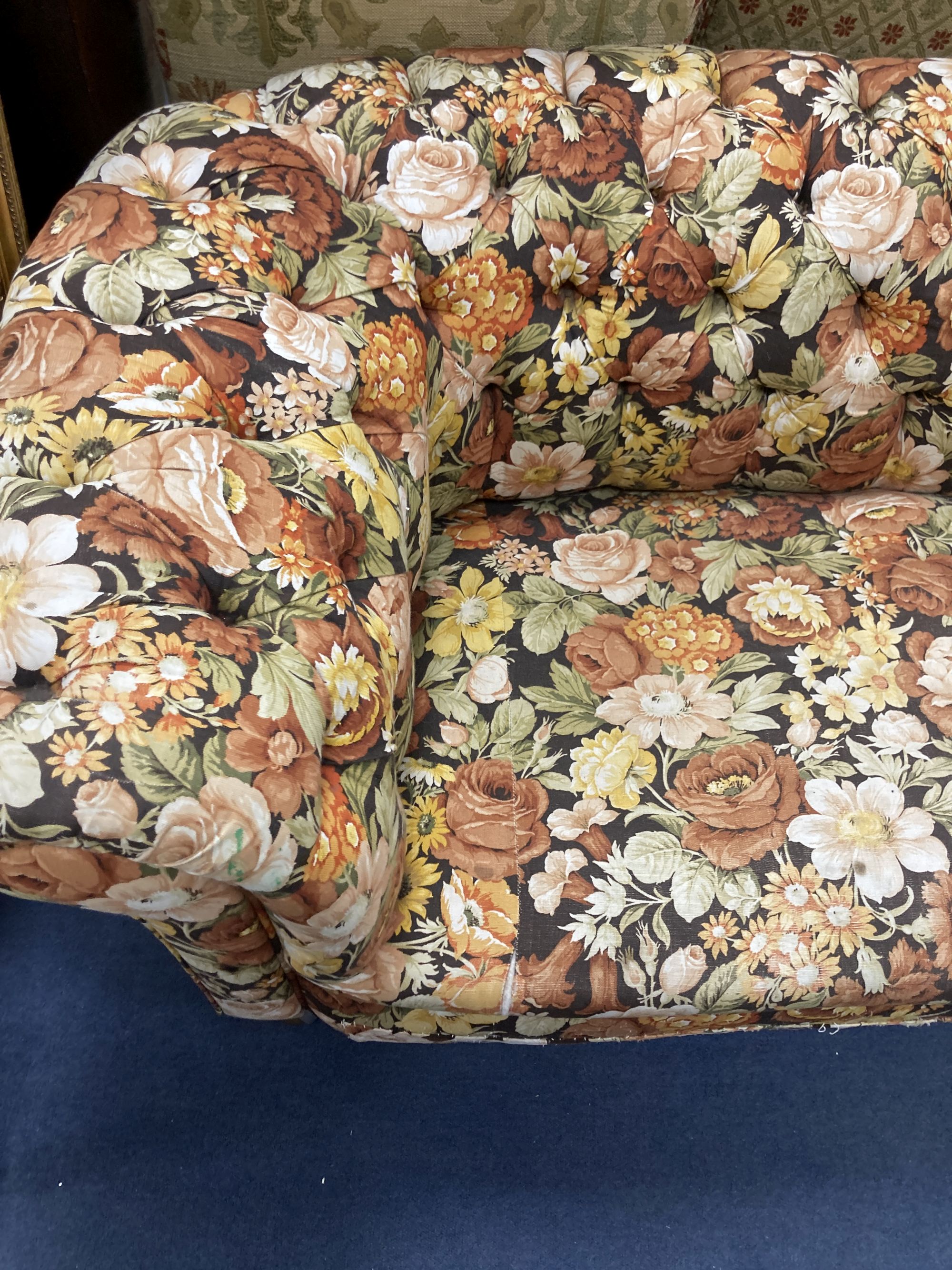 A Victorian floral upholstered Chesterfield settee, length 200cm, depth 85cm, height 68cm
